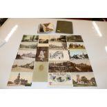 A quantity of various local postcards together wit