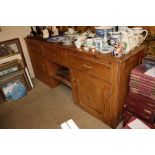 An antique pine dresser base