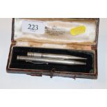 A Sampson & Mordan & Co. silver propelling pencil together with a J M & Co silver propelling pencil