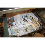 A large collection of various postcards