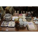 A quantity of commemorative china, tins, cased set