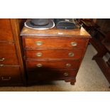A mahogany chest fitted four drawers of small prop