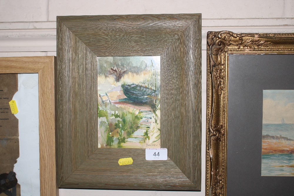 A framed and glazed watercolour study of a boat signed Ann Snow