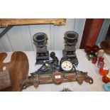 A cast figural decorated two hole mantle clock AF