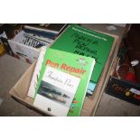 Two boxes of various books relating to pens