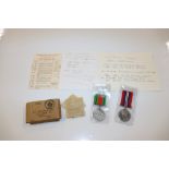 WWII officers group of two medals in named box of