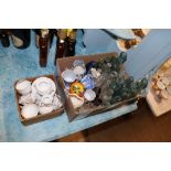 A box of vintage glass bottles, child's teaware et