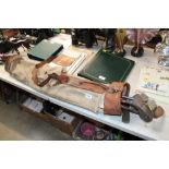 A canvas bag and contents of vintage golf clubs