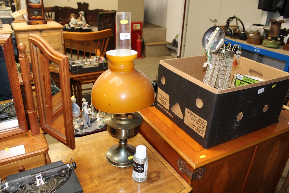 An oil lamp with a container of lamp oil