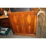 A reproduction TV cupboard
