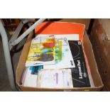 A box of artists' materials including drawing pads