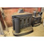 A Hergom cast iron wood burner, measurements in ex