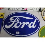 A reproduction enamel Ford sign