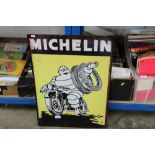 A reproduction tin Michelin sign