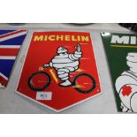 A reproduction enamel Michelin sign
