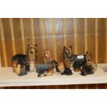 Twelve various porcelain and other dog ornaments