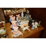 A collection of various dog ornaments, figurines,