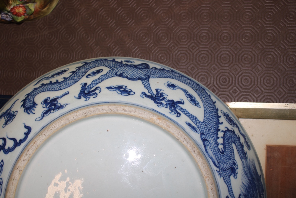 A Chinese dragon decorated blue and white charger, - Image 6 of 6