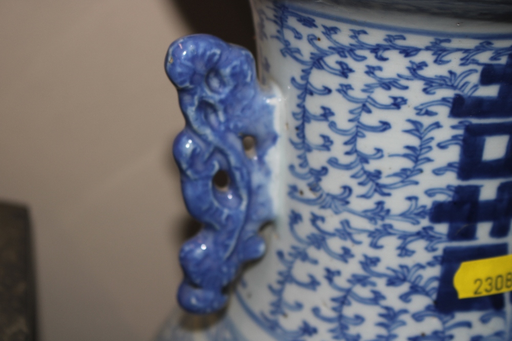 A Chinese blue and white baluster vase - Image 3 of 7