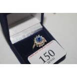 A Hallmarked Sterling silver ring set with blue an
