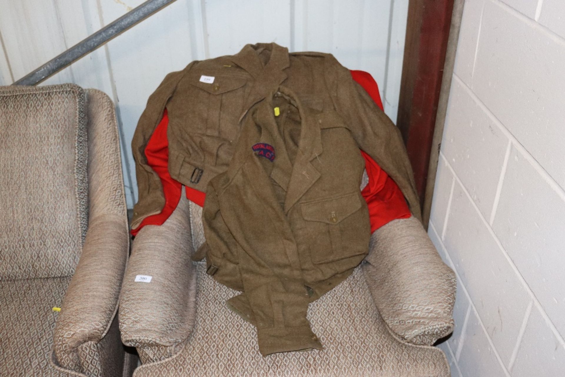 A Royal Artillery battle dress blouse, and other a