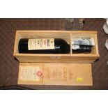 A bottle of 1989 Cruz Port in wooden case