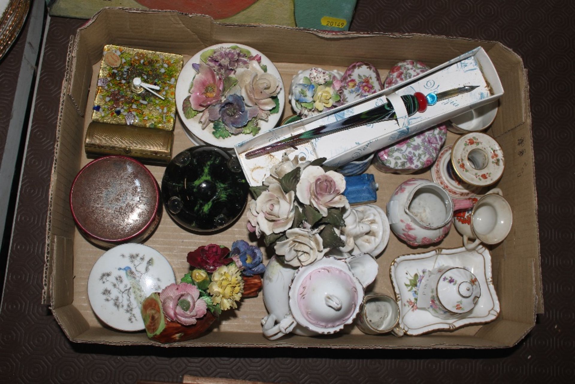 A tray box and contents of various porcelain orname