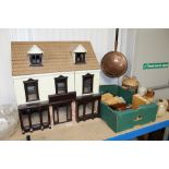 A dolls house and box of dolls house furniture