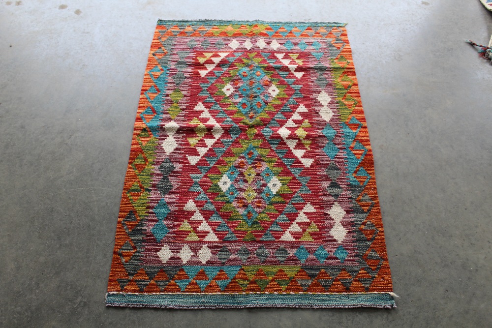 An approx. 4'10" x 2'7" Chobi Kelim rug