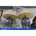 A pair of modern table lamps and shades