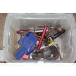 A box of various tools to include two bench vices