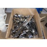 A box of silver plated and stainless steel cutlery