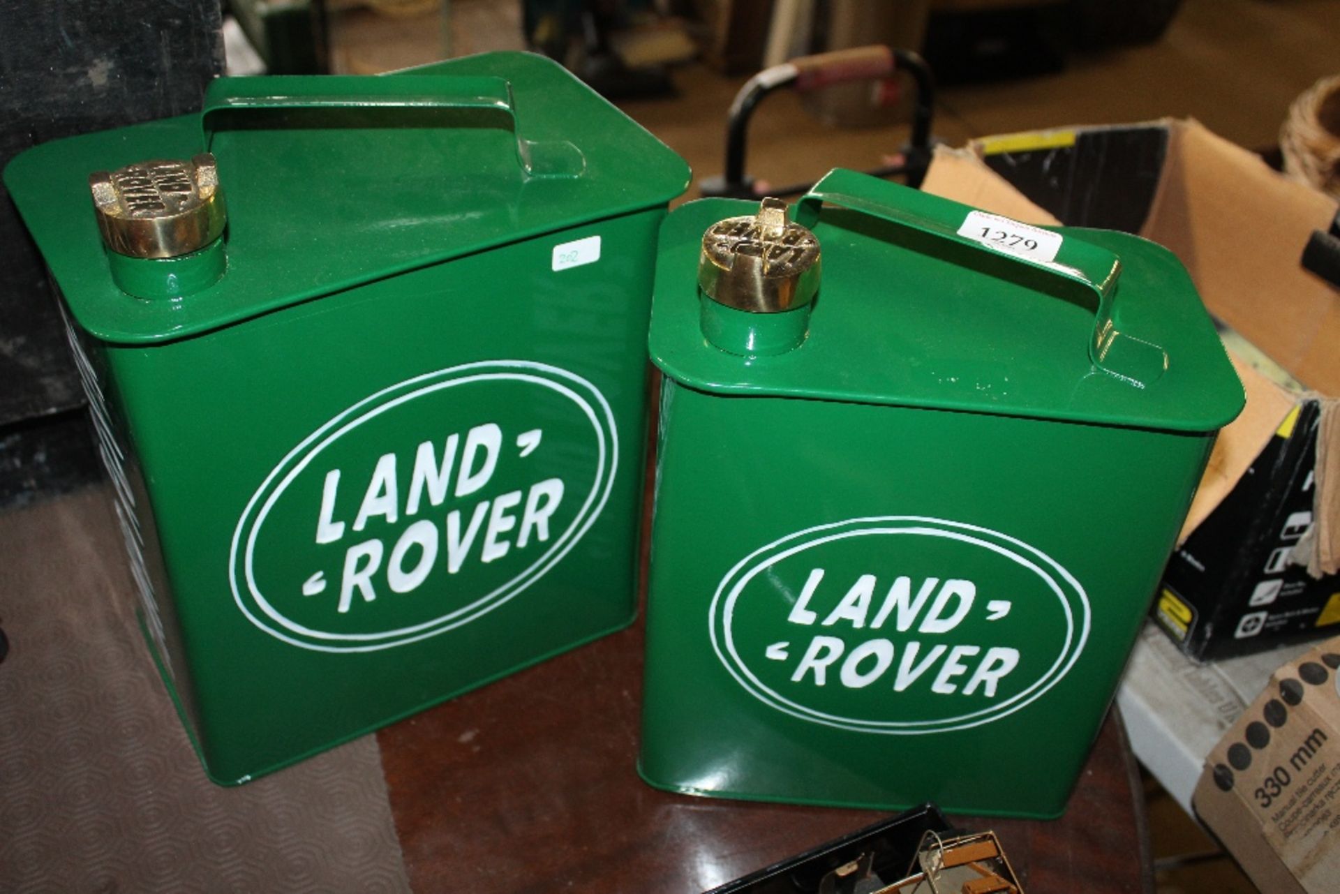 Two reproduction Land Rover storage boxes in the f