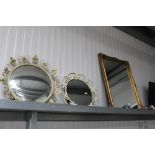 A gilt framed wall mirror, circular wall mirror an