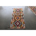 An approx. 4'8" x 2'1" Chobi Kelim runner