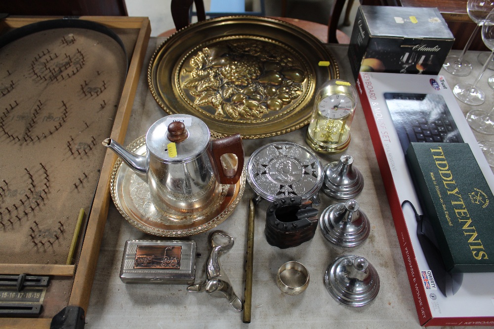 A collection of metalware to include novelty bottl