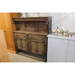 An oak court cupboard