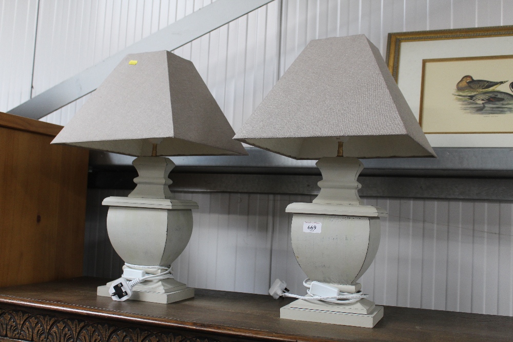 A pair of painted wooden table lamps and shades