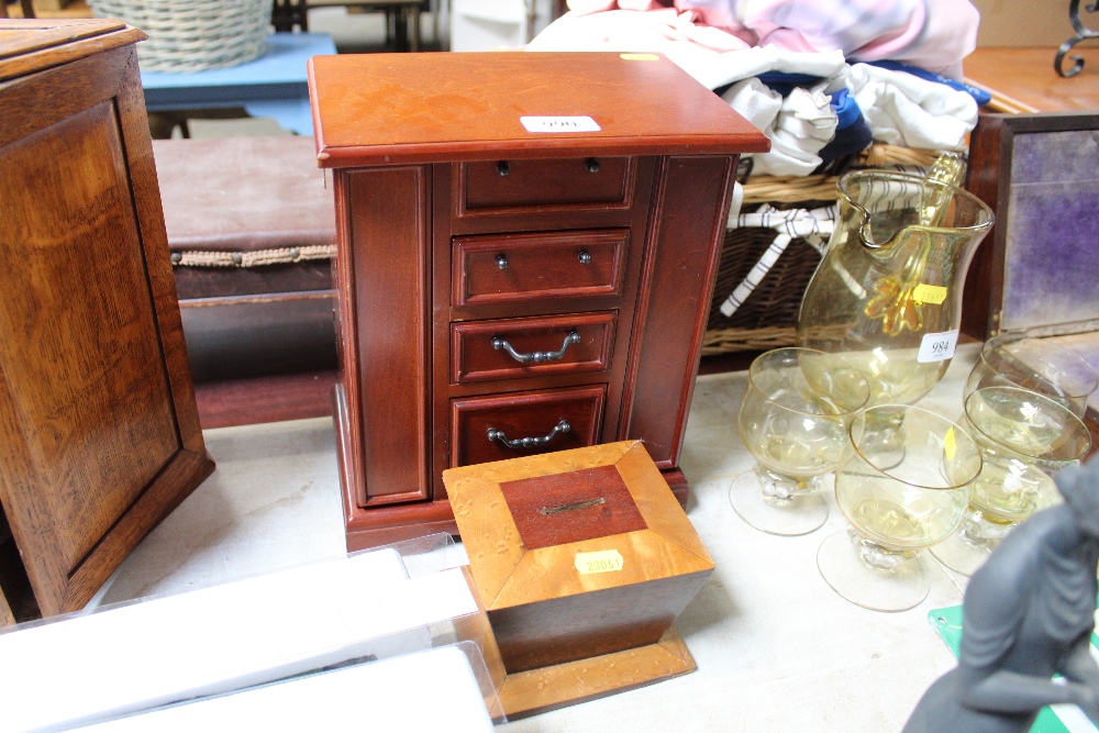 A jewellery chest and a wooden money box