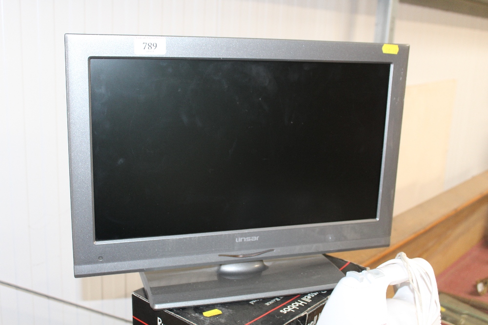 A Linsar TV with built in DVD player, lacking powe