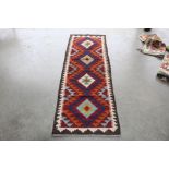 An approx. 6'2" x 2' Maimana Kelim runner