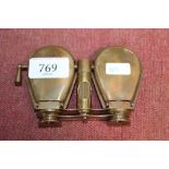 A pair of reproduction brass folding binoculars