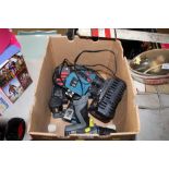 A box containing a cordless drill, batteries and one charger