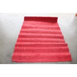 An approx. 6'5" x 4'6" modern rug