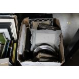 A box of various picture frames