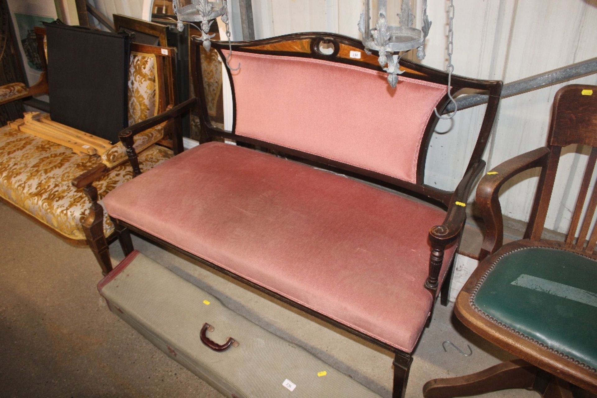 An Edwardian salon sofa