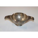 A twin handled silver pedestal quaich, Birmingham 19