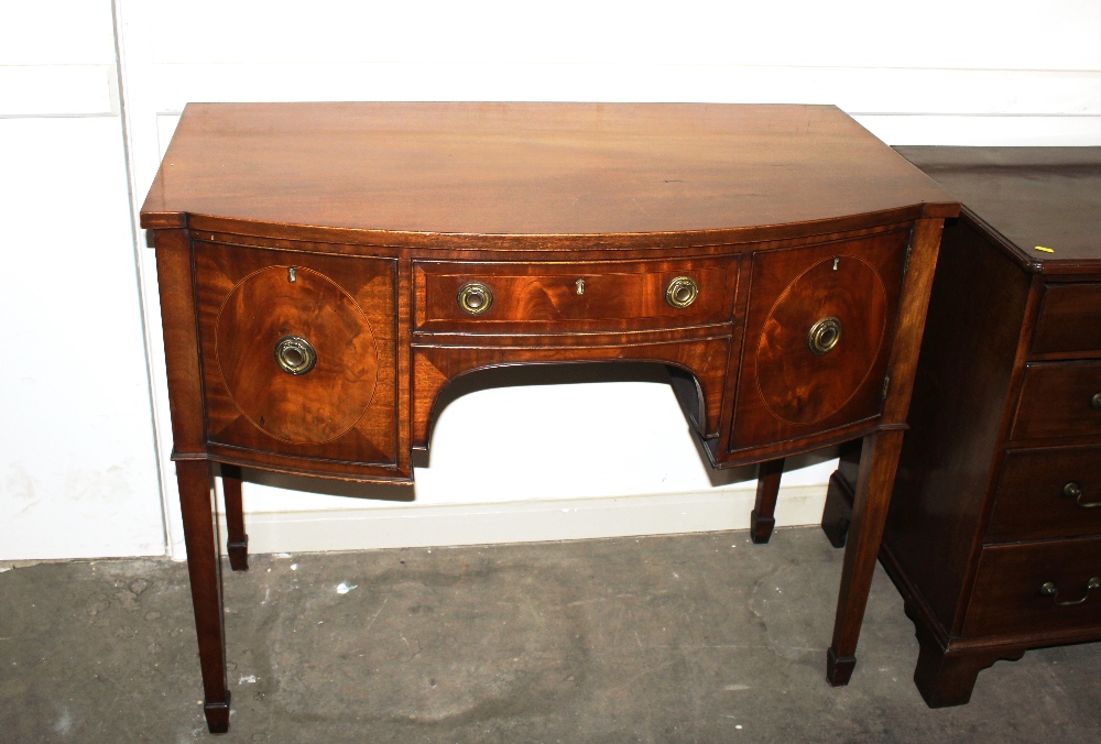 A George III style mahogany bow fronted sideboard