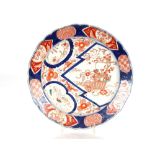 A pair of Imari scallop border chargers