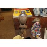 A wood carving by Syd Hotton 1988 of a peregrine f